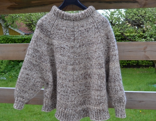 Stickad poncho Arvingen
